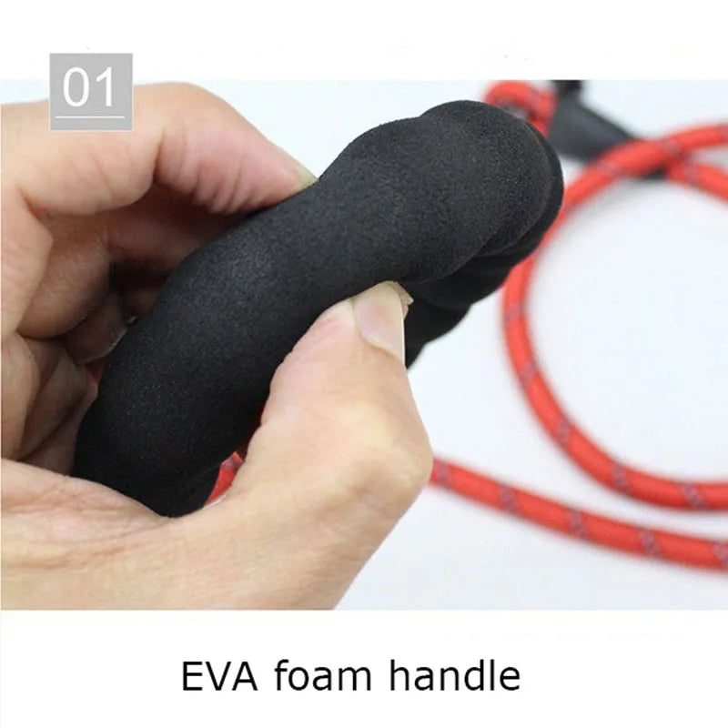 Hand squeezing the soft EVA foam leash handle
