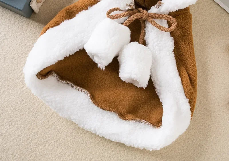Pet wearing a Santa or reindeer hooded Christmas cape with Velcro neck closure