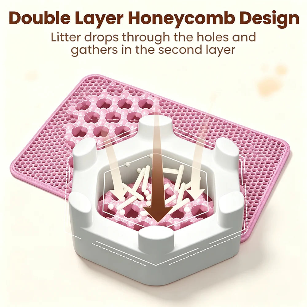 Litter falling through the top layer of a pink honeycomb cat litter mat