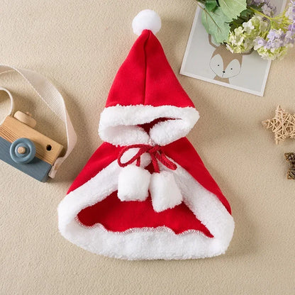 Pet wearing a Santa or reindeer hooded Christmas cape with Velcro neck closure