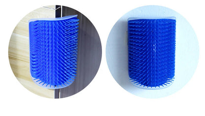 Cat corner self-groomer brush on a wall corner with a cat rubbing its cheek on it