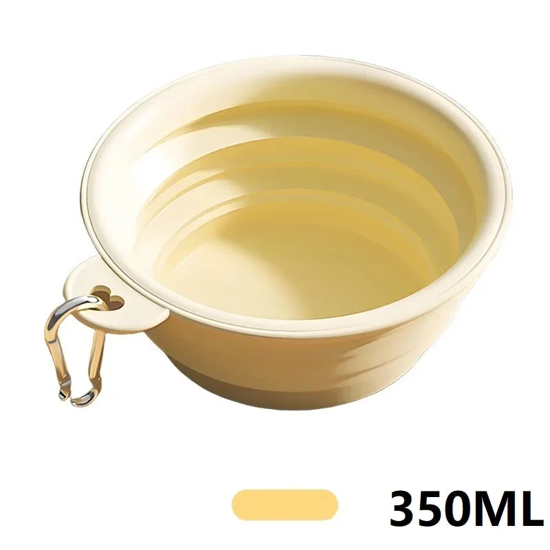Yellow collapsible silicone dog bowl with carabiner clip