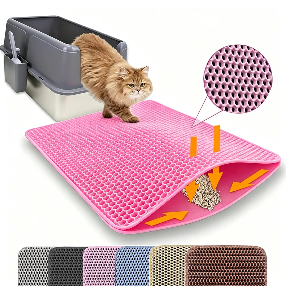 Pink double-layer honeycomb cat litter mat in front of a litter box