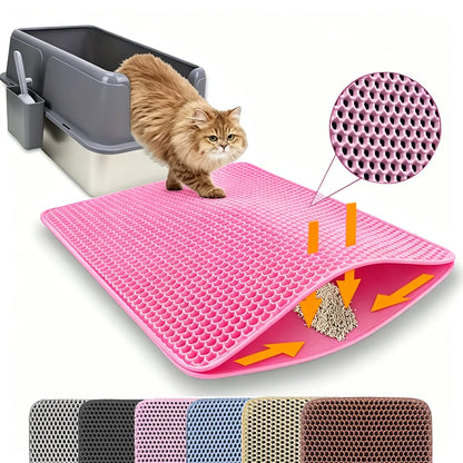 Pink double-layer honeycomb cat litter mat in front of a litter box