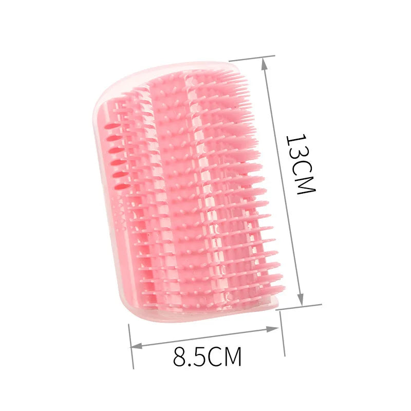 Cat corner self-groomer brush on a wall corner with a cat rubbing its cheek on it