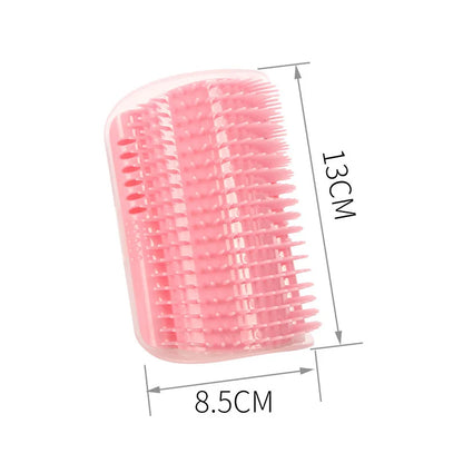 Cat corner self-groomer brush on a wall corner with a cat rubbing its cheek on it