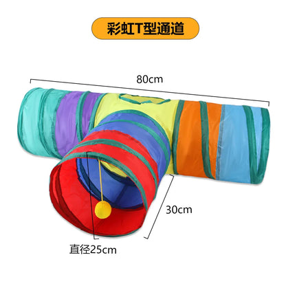Cat peeking out of the rainbow T-shape foldable cat tunnel with dangling ball toy