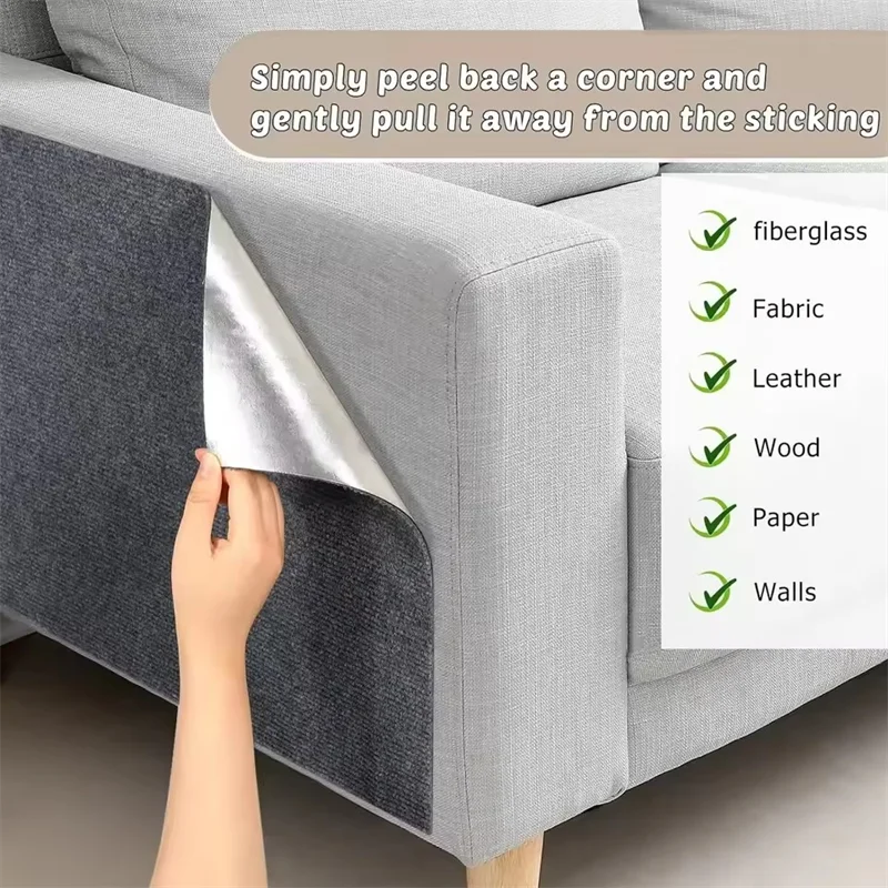 Peeling the self-adhesive scratch mat off a sofa arm (grey shown)