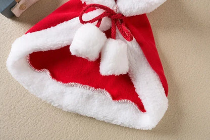 Pet wearing a Santa or reindeer hooded Christmas cape with Velcro neck closure
