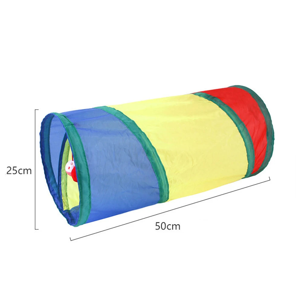Cat peeking out of the rainbow short foldable cat tunnel with dangling ball toy