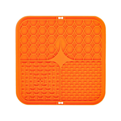 Orange silicone lick mat with four textured sections