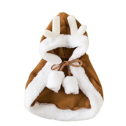 Pet wearing the reindeer brown hooded Christmas cape with Velcro neck closure