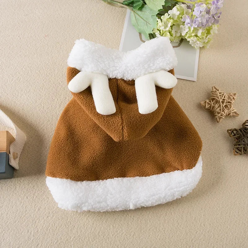 Pet wearing a Santa or reindeer hooded Christmas cape with Velcro neck closure